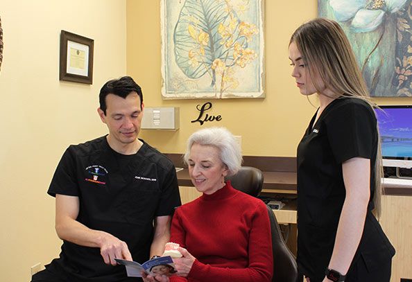 Dr. Jose Montoya educating a patient